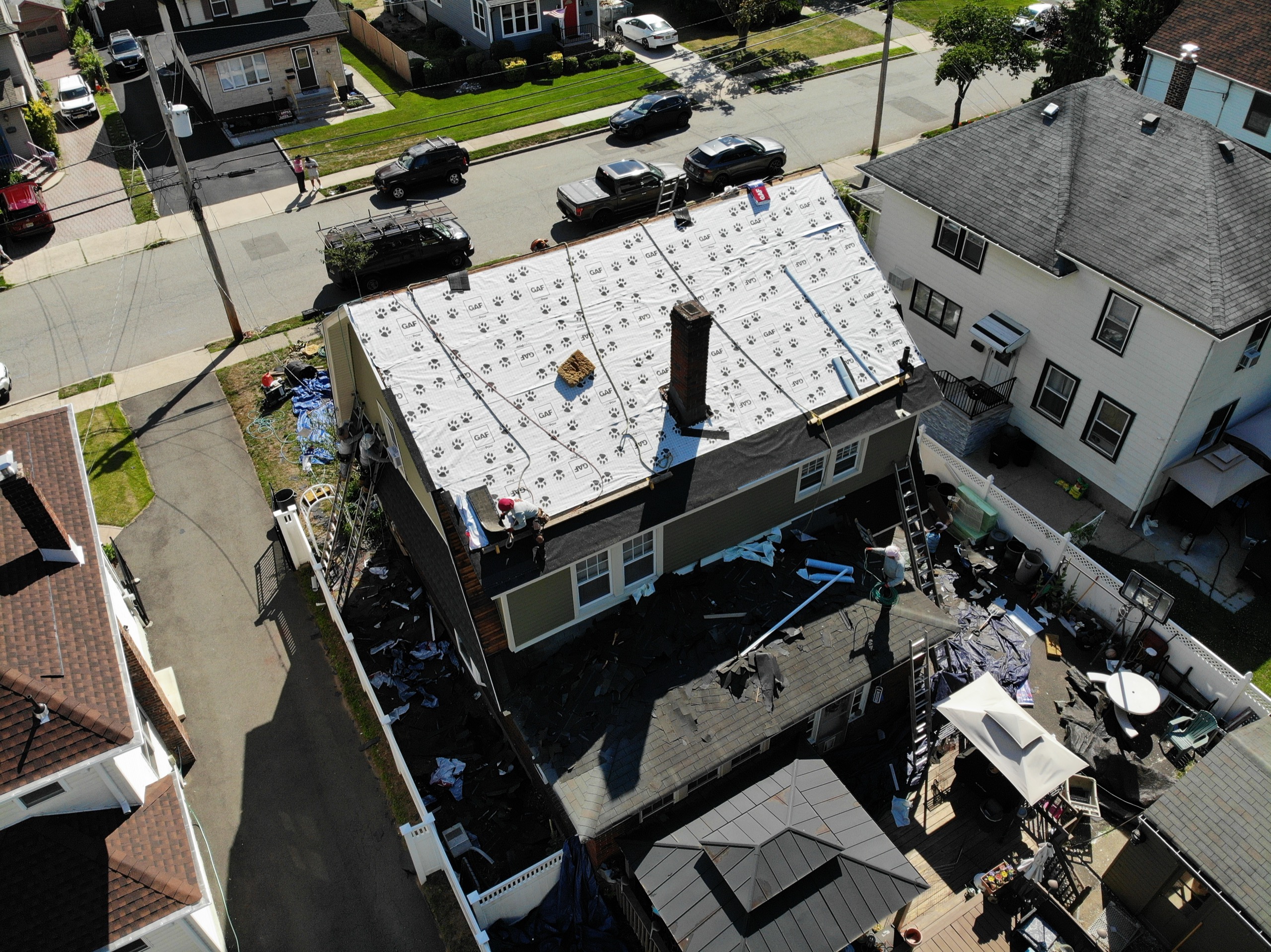A completed All Elite tear-off and re-roof. The same scope we run on the pre-1940 housing that dominates Essex County.